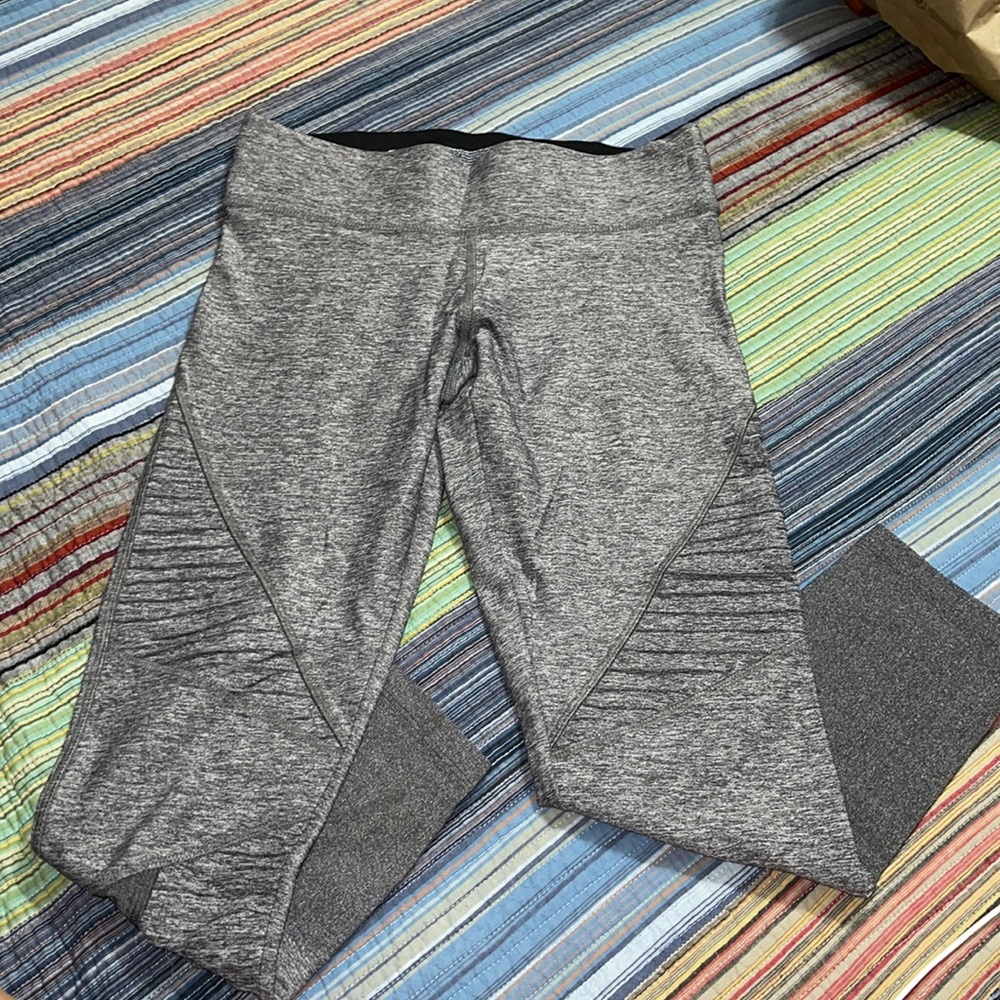 pink Victoria’s Secret ultimate grey mid leggings.